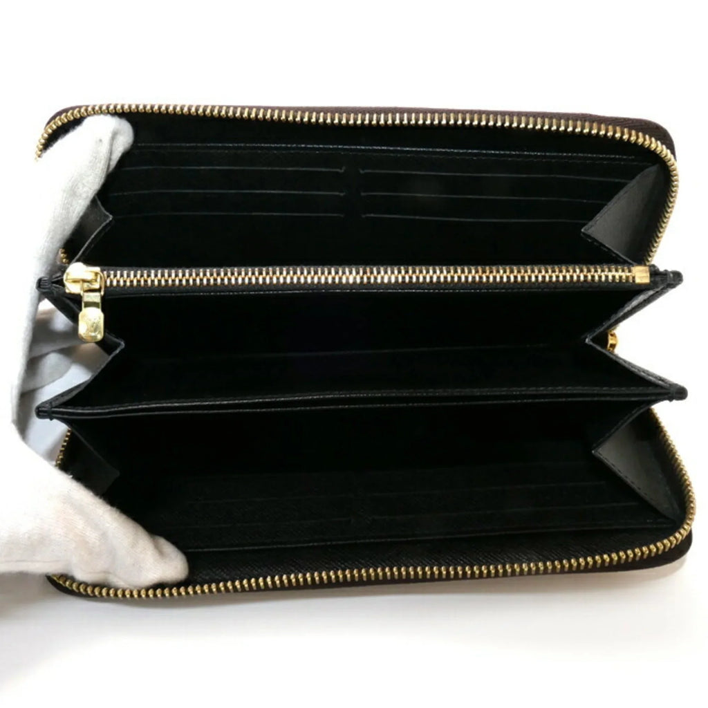 (Good) Pre-Owned Zippy Unisex Zipper Wallet Round Monogram Long M69353 Giant
