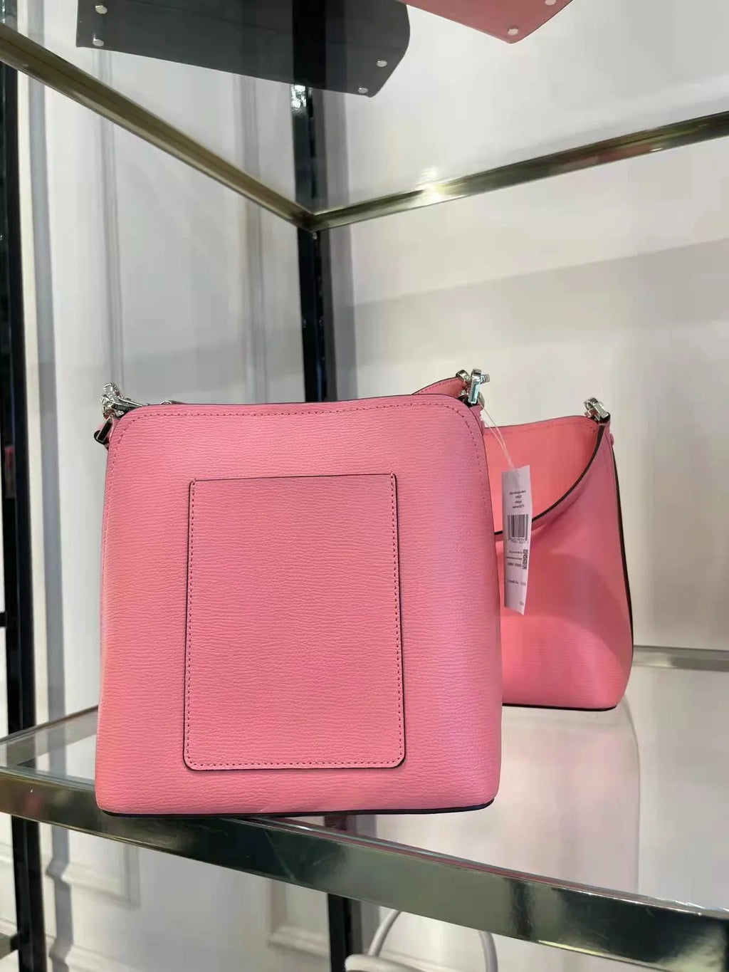 WKR00439 Peach in Kate bag Spade bucket small darcy Nectar
